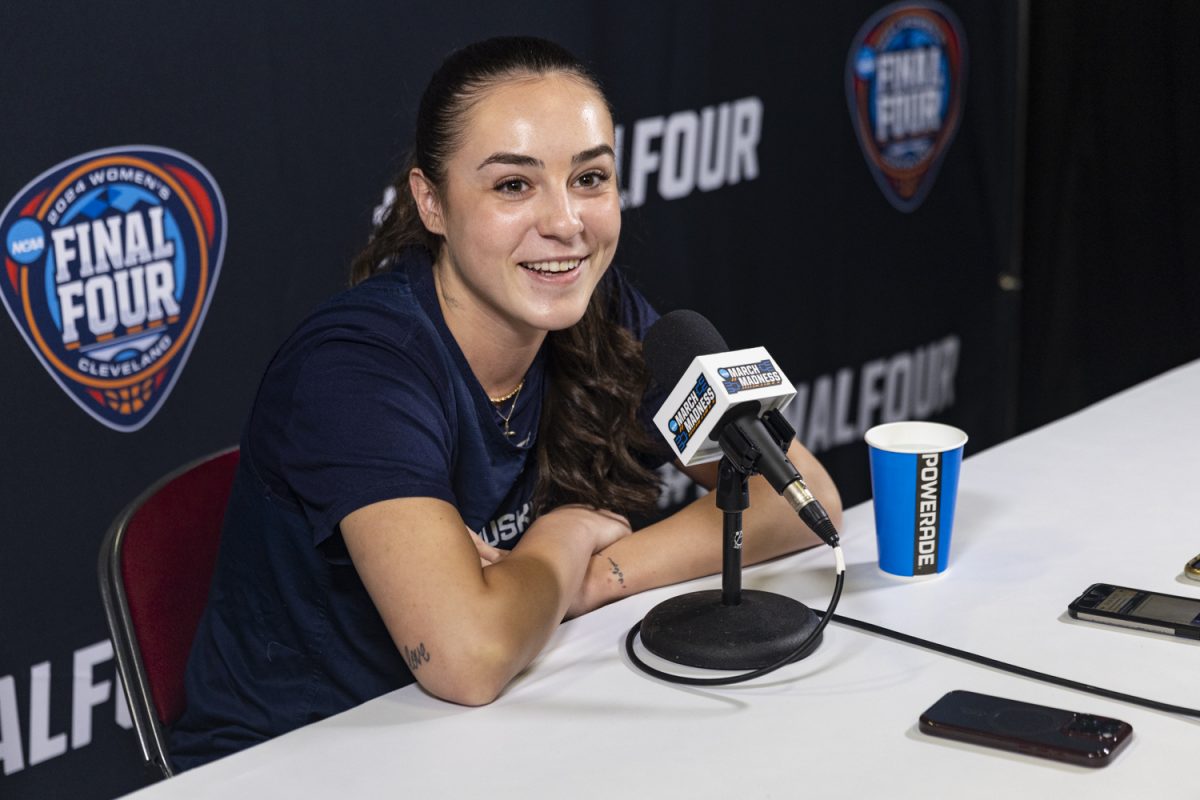 UConn+guard+Nika+M%C3%BChl+answers+questions+from+reporters+during+a+day+of+press+conferences%2C+open+locker+rooms%2C+and+open+practices+ahead+of+an+NCAA+Tournament+Final+Four+game+between+No.+1+Iowa+and+No.+3+UConn+at+Rocket+Mortgage+FieldHouse+in+Cleveland%2C+Ohio%2C+on+Thursday%2C+April+4%2C+2024.+The+Hawkeyes+and+the+Huskies+face+off+Friday+at+8%3A30+p.m.+CT.