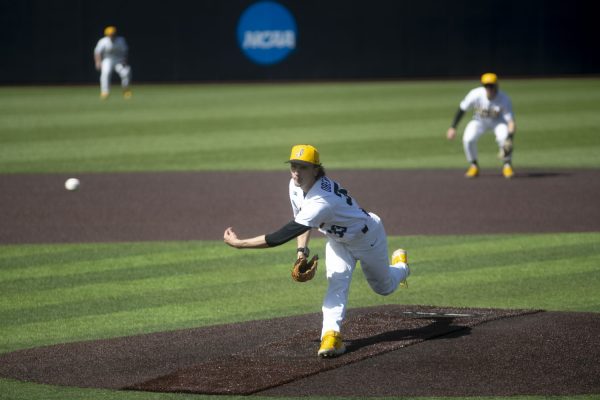 Iowa pitcher Cade Obermueller throws a pitch during a baseball game between Michigan and Iowa at Duane Banks Field in Iowa City, Iowa. The Hawkeyes defeated the Wolverines 3-2 in extra innings.