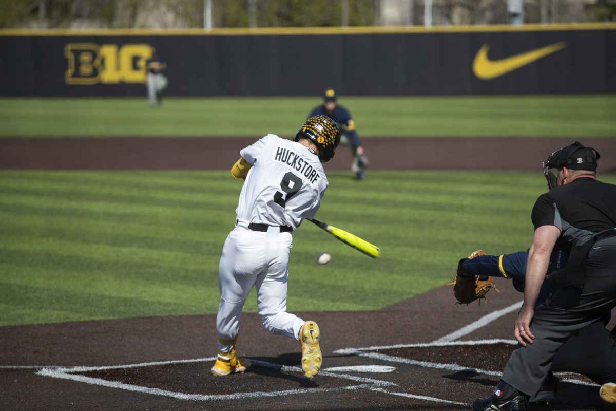Iowa+Kyle+Huckstorf+makes+contact+with+a+pitch+during+a+baseball+game+between+Michigan+and+Iowa+at+Duane+Banks+Field+in+Iowa+City%2C+Iowa.+The+Hawkeyes+defeated+the+Wolverines+3-2+in+extra+innings.
