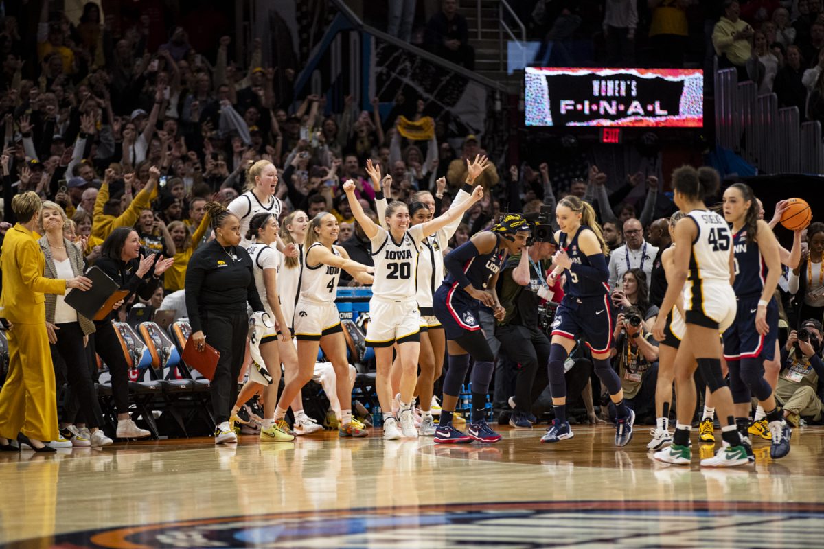 Iowa guard Kate Martin celebrates after a NCAA Tournament Final Four game between No. 1 Iowa and No. 3 UConn at Rocket Mortgage FieldHouse in Cleveland, Ohio, on Friday, April 5, 2024. The Hawkeyes defeated the Huskies, 71-69. (Ayrton Breckenridge/The Daily Iowan)