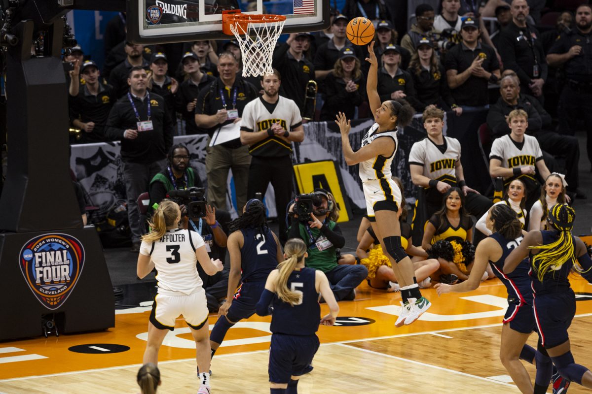 Iowa forward Hannah Stuelke goes for a layup during a NCAA Tournament Final Four game between No. 1 Iowa and No. 3 UConn at Rocket Mortgage FieldHouse in Cleveland, Ohio, on Friday, April 5, 2024. The Hawkeyes defeated the Huskies, 71-69.