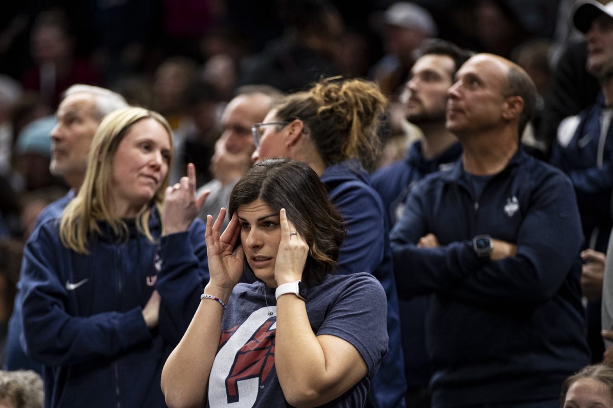 A UConn fan reacts to action during a NCAA Tournament Final Four game between No. 1 Iowa and No. 3 UConn at Rocket Mortgage FieldHouse in Cleveland, Ohio, on Friday, April 5, 2024. The Hawkeyes defeated the Huskies, 71-69.