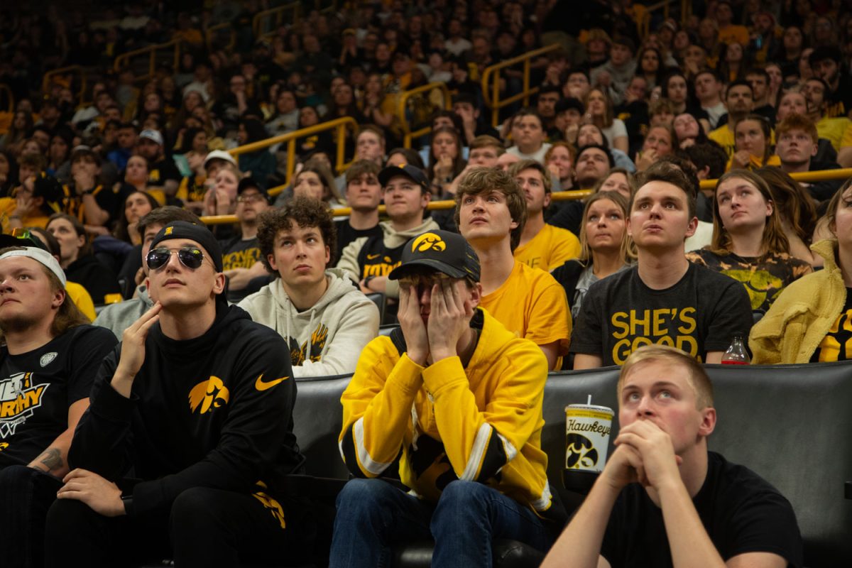 Fans react to a South Carolina run to start the second half during a watch party of the NCAA women’s basketball national championship game between No.1 seeded Iowa and No.1 seeded South Carolina at Carver-Hawkeye Arena in Iowa City on April 7. South Carolina defeated Iowa 87-75.