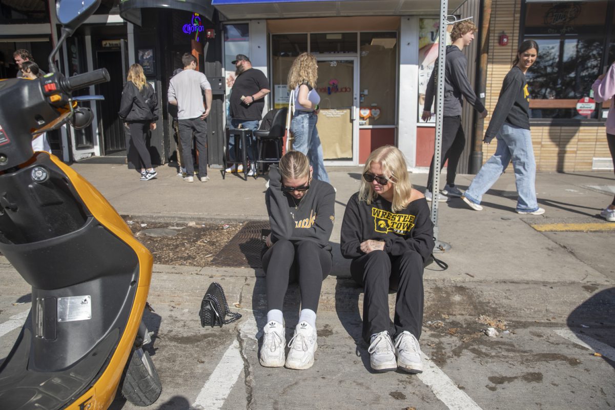 Iowa fans sit outside Summit after the NCAA Championship game between No. 1 Iowa and No. 1 South Carolina on Sunday, April 7, 2024. South Carolina defeated Iowa 87-75.