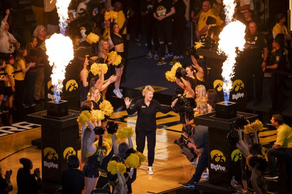 Iowa head coach Lisa Bluder walks onto the court during an end-of-season celebration to honor the Iowa women’s basketball team’s historic run in the NCAA tournament at Carver-Hawkeye Arena in Iowa City, Iowa, on Wednesday, April 10, 2024. No. 1 South Carolina defeated No. 1 Iowa, 87-75, during an NCAA Championship game at Rocket Mortgage FieldHouse in Cleveland, Ohio, on Sunday, April 7, 2024. The Gamecocks finished the season undefeated with 38 wins. The game marks Iowa’s second straight runner-up finish for the title.
