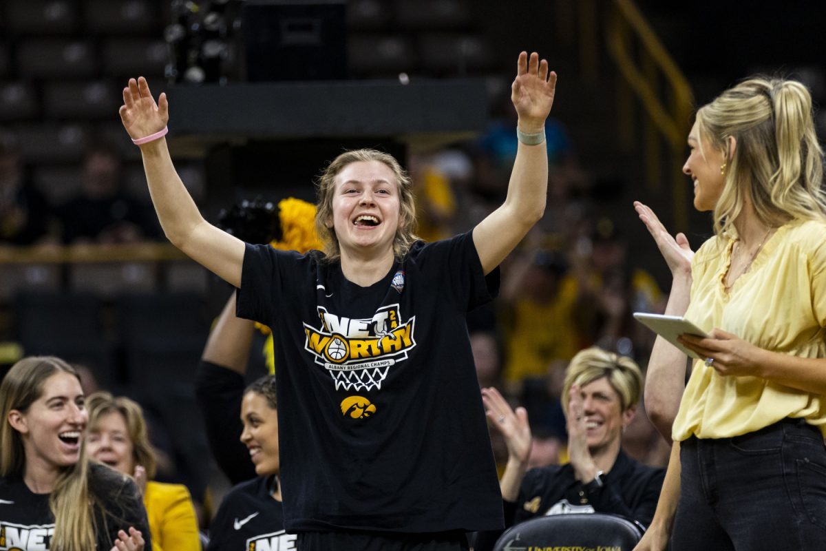 Iowa guard Molly Davis waves to fans during a season celebration to honor the Iowa women’s basketball team’s historic run in the NCAA tournament at Carver-Hawkeye Arena in Iowa City, Iowa, on Wednesday, April 10, 2024. No. 1 South Carolina defeated No. 1 Iowa, 87-75, during an NCAA Championship game at Rocket Mortgage FieldHouse in Cleveland, Ohio, on Sunday, April 7, 2024. The Gamecocks finished the season undefeated with 38 wins. The game marks Iowa’s second straight runner-up finish for the title.