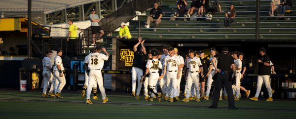Iowa relief pitcher Aaron Savary celebrates a clean inning during a baseball game between St. Thomas and Iowa at Duane Banks Field in Iowa City, Iowa. The Hawkeyes defeated the Tommies 17-11.