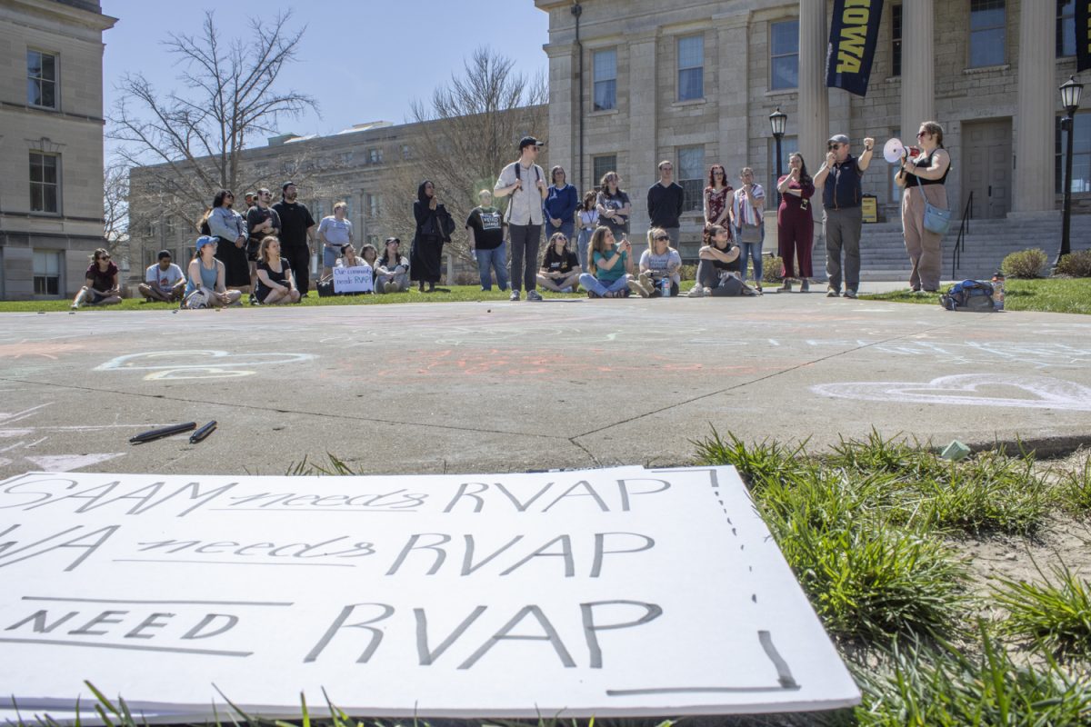 Activists+speak+to+a+gathered+crowd+during+an+event+on+the+Pentacrest+protesting+the+University%E2%80%99s+removal+of+RVAP%2C+the+Rape+Victim+Advocacy+Program%2C+on+Saturday%2C+April+13%2C+2024.