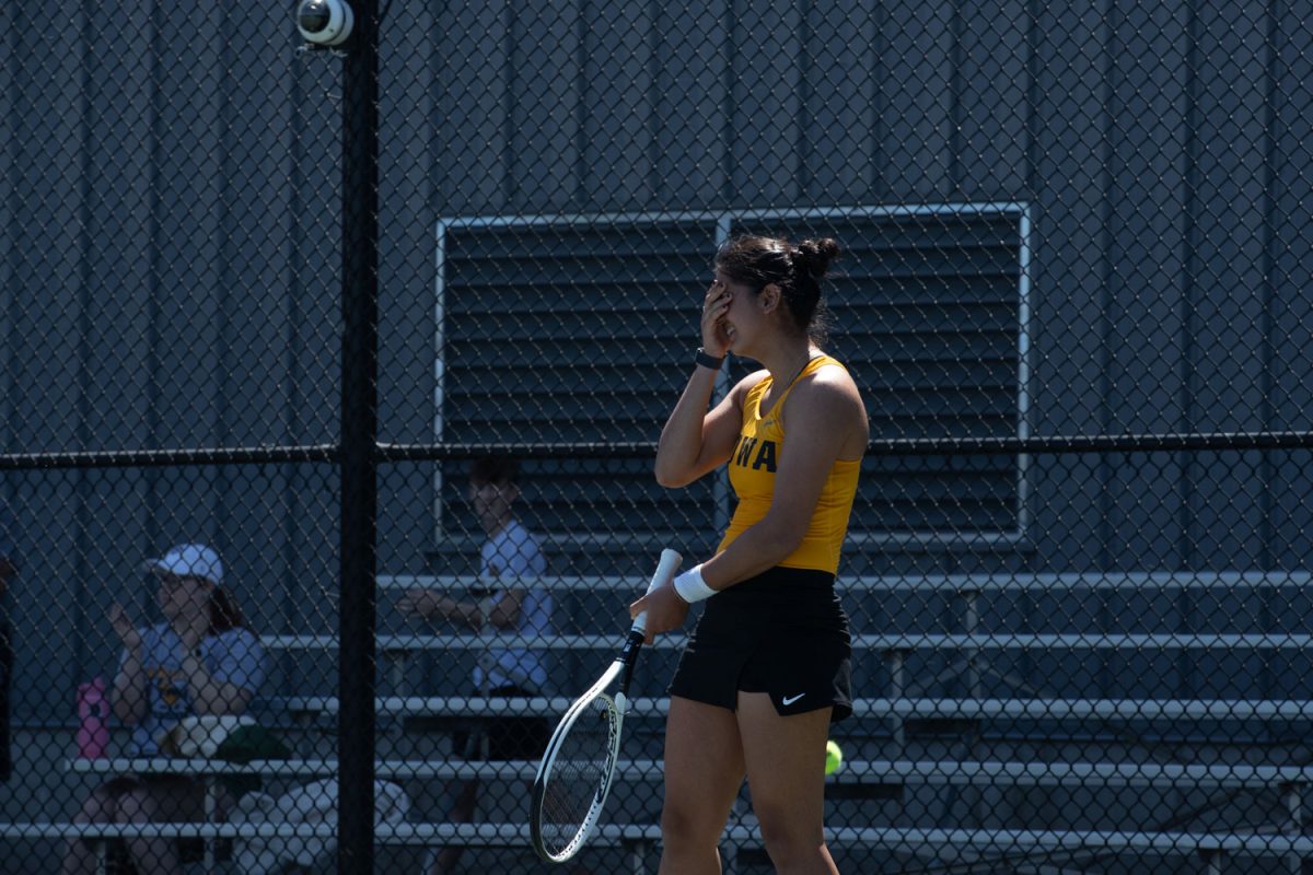 Senior, Vipasha Mehra, after closing her singles match with a win at a tennis meet at the Hawkeye Tennis and Recreational Complex in Iowa City on Sunday, April 14, 2024. The Hawkeyes swept Penn State, 4-0.