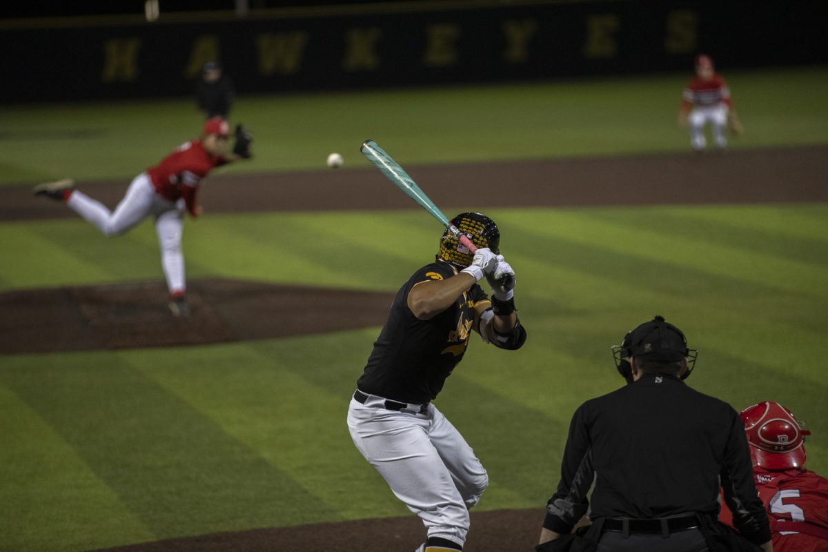 Iowa infielder Raider Tello watches a pitch during a baseball game between Bradley and Iowa at Duane Banks Field in Iowa City, Iowa. The Hawkeyes defeated the Braves 11-6.