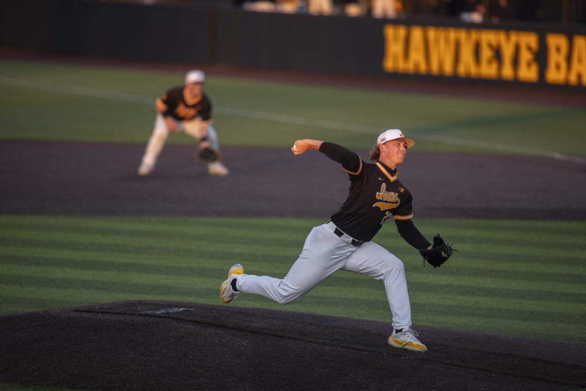 Iowa reliever Drew Deremer winds up during a baseball game between Bradley and Iowa at Duane Banks Field in Iowa City, Iowa. The Hawkeyes defeated the Braves 11-6.