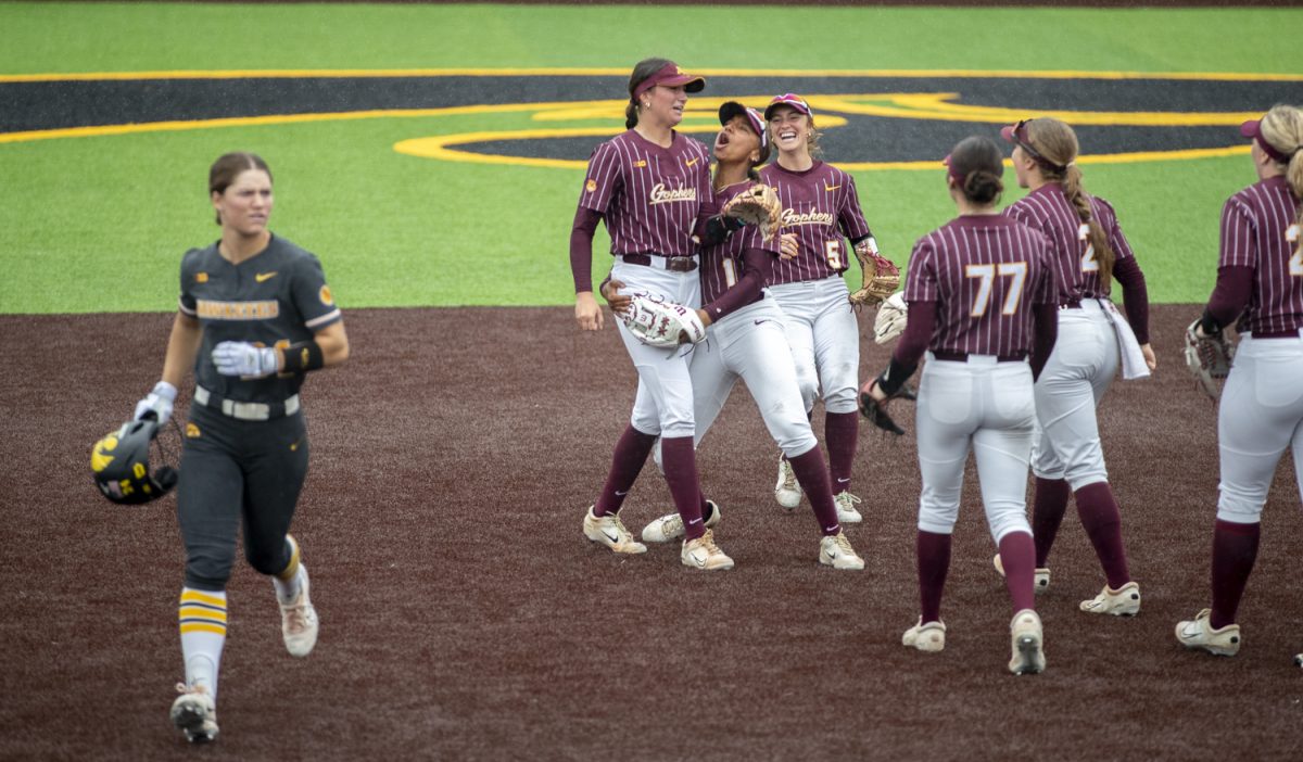 Minnesota+players+celebrate+the+final+out+after+a+softball+game+between+Minnesota+and+Iowa+at+Bob+Pearl+Field+in+Iowa+City%2C+Iowa.+The+Golden+Gophers+defeated+the+Hawkeyes+6-2+in+extra+innings.