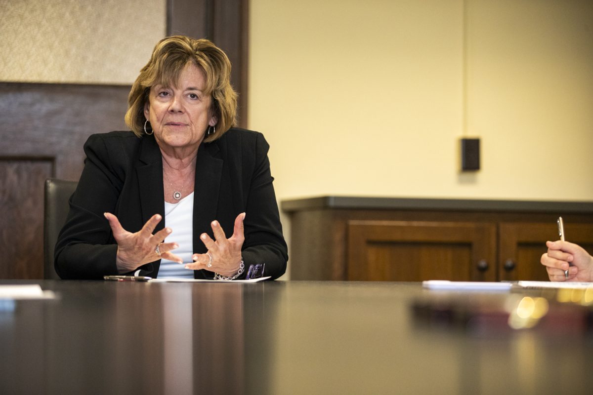 University of Iowa President Barbara Wilson speaks with reporters from “The Daily Iowan” in Jessup Hall in Iowa City on Tuesday, April 30, 2024.