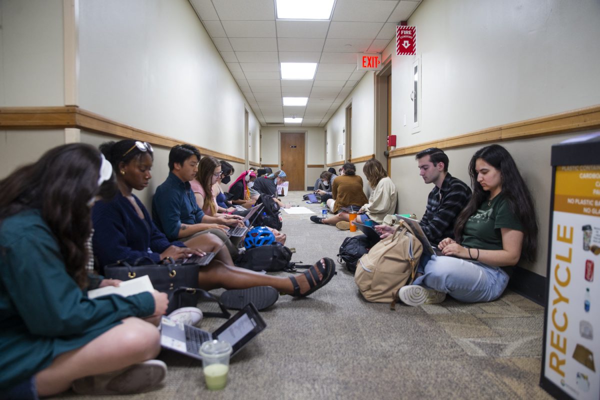 Protestors study quietly during a sit in protesting the closure of RVAP, outside of Vice President of Student Life, Sarah Hansen’s offices in the Iowa Memorial Union on Wednesday, May 1, 2024.