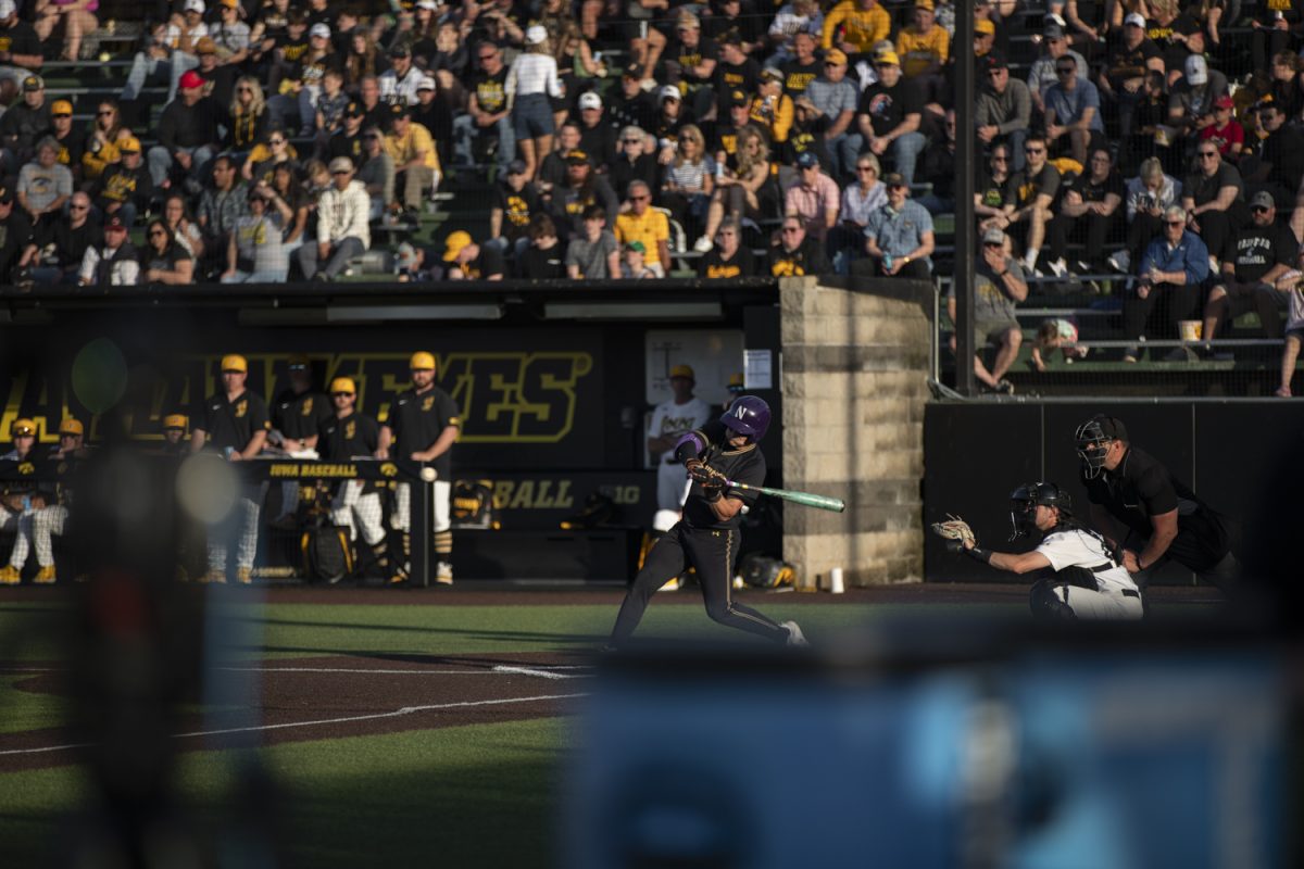 Northwestern infielder Vince Bianchina swings on a pitch during a baseball game between Iowa and Northwestern at Duane Banks Field on Friday, May 3, 2024. The Hawkeyes defeated the Wildcats in a tight 4-3 finish.