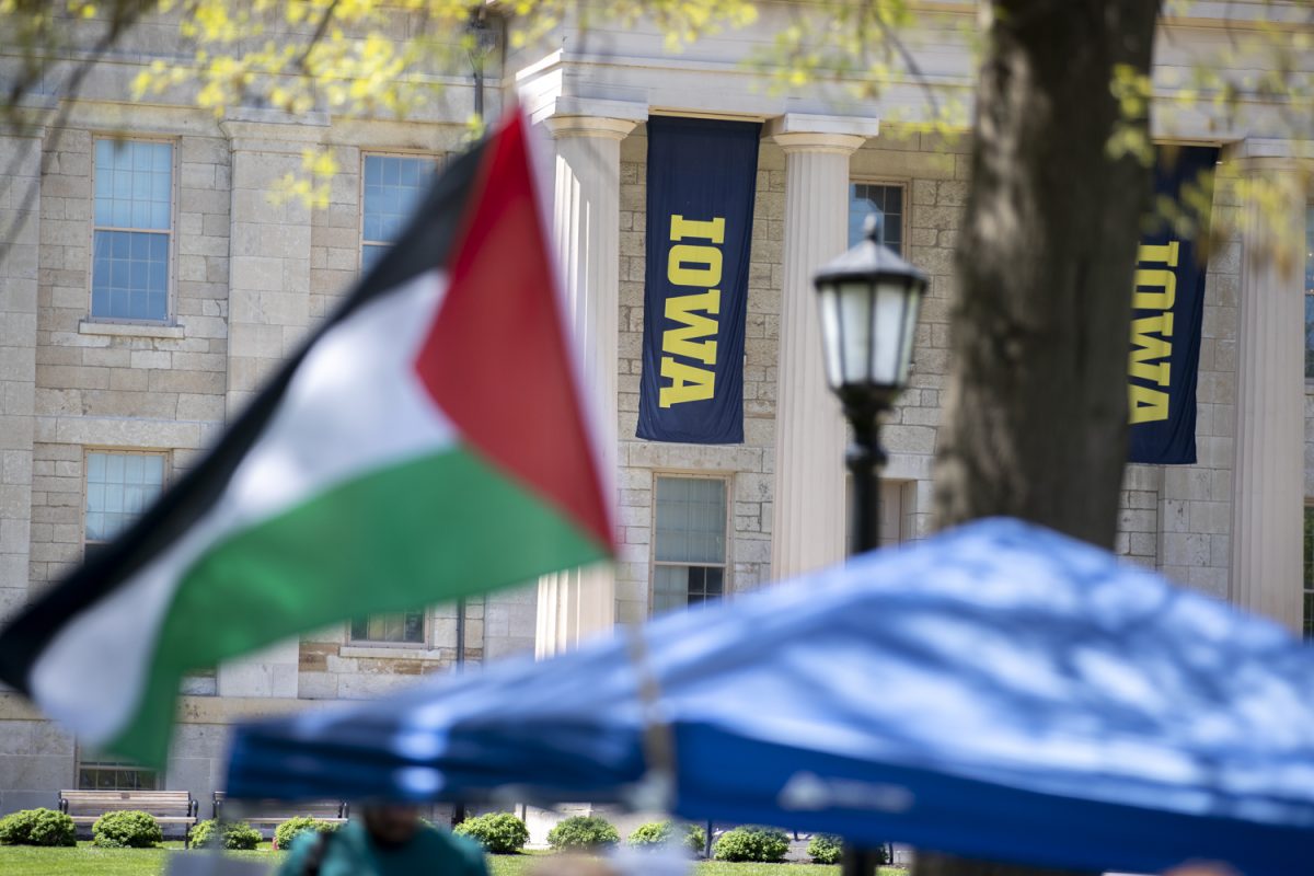 The Palestine flag waves during a three-day solidarity event on the Pentacrest in Iowa City on Friday, May 3, 2024. This demonstration was organized by the Iowa City Students for Justice in Palestine.