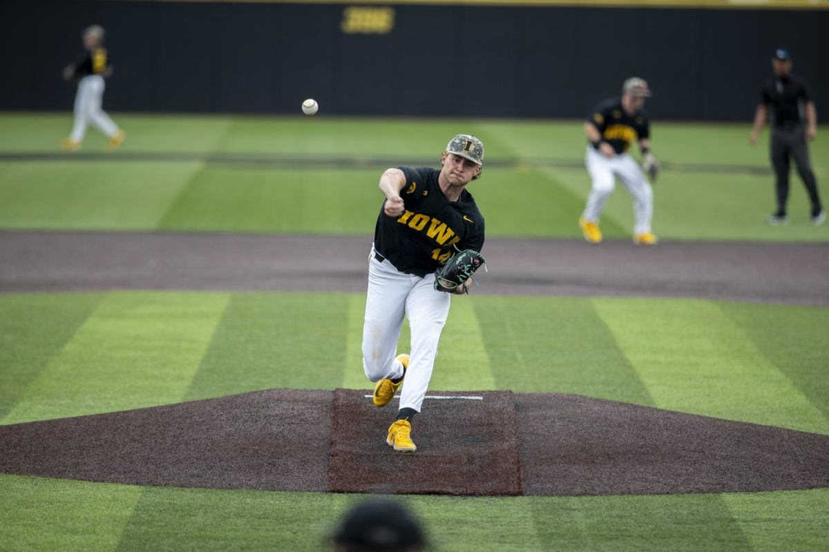 Iowa pitcher Brody Brecht throws a warmup during a baseball game between Northwestern and Iowa at Duane Banks Field in Iowa City, Iowa. Friday, May 3, 2024. The Hawkeyes defeated the Wildcats 9-2.