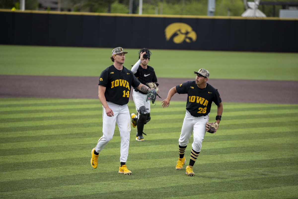 Iowa+pitcher+Brody+Brecht+and+infielder+Raider+Tello+celebrate+getting+through+the+eighth+inning+during+a+baseball+game+between+Northwestern+and+Iowa+at+Duane+Banks+Field+in+Iowa+City%2C+Iowa.+Friday%2C+May+3%2C+2024.+The+Hawkeyes+defeated+the+Wildcats+9-2.