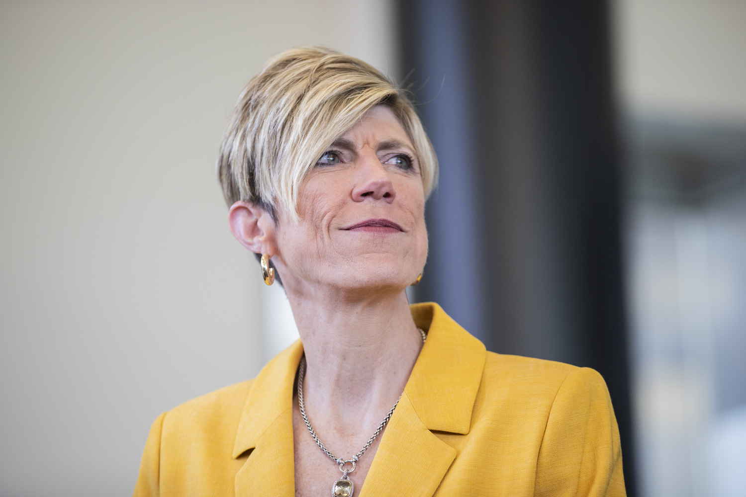 Iowa head coach Jan Jensen listens as Beth Goetz speaks about her during an introductory press conference for Head coach Jan Jensen at Carver-Hawkeye Arena on Wednesday  May 15, 2024. The conference marks Jensen’s first as head coach of the Hawkeyes. Jan Jensen and Beth Goetz answered questions from the media about Jensen’s new position as head coach.