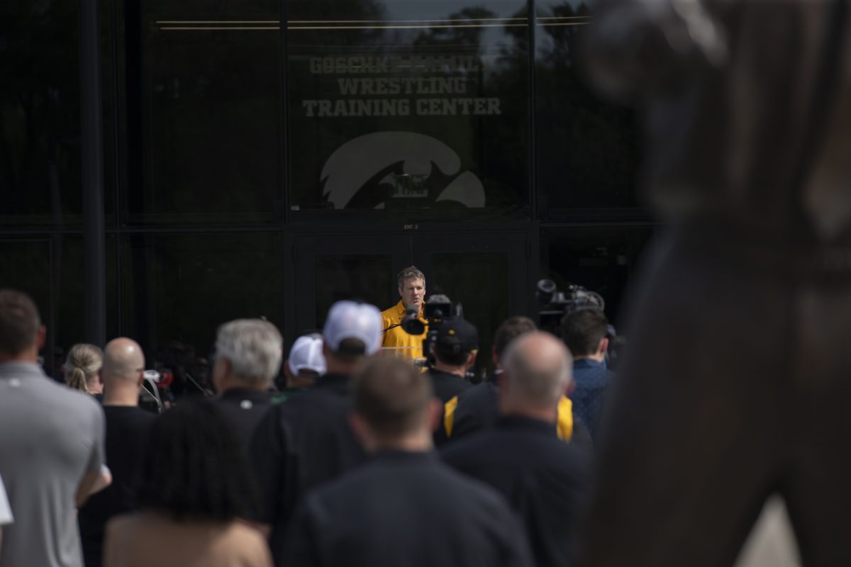 Iowa Men’s Wrestling Coach Tom Brands speaks to the crowd during the dedication ceremony for the University of Iowa’s Goschke Family Wrestling Training Center on Thursday, May 30, 2024.