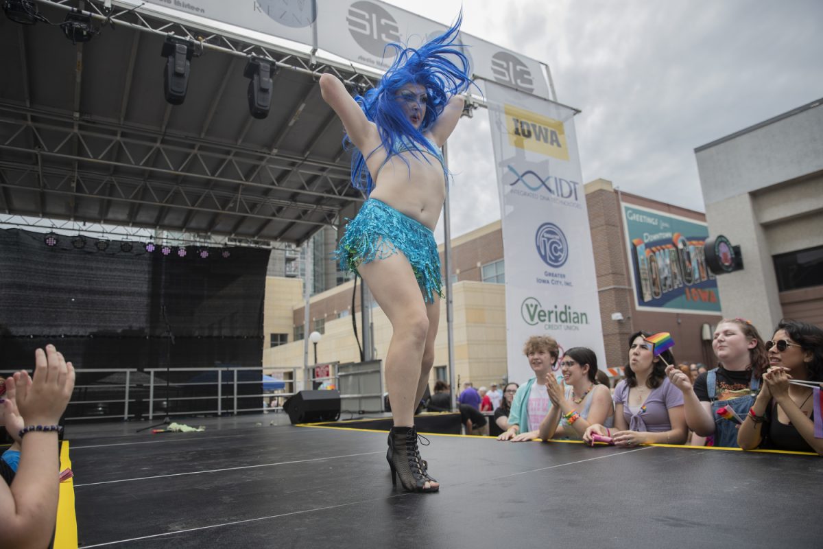 A member of the UAY Draglings performs during the 53rd annual pride festival in downtown Iowa City on Saturday, June 15, 2024. The event included a parade, performances, and local vendor stations around downtown.