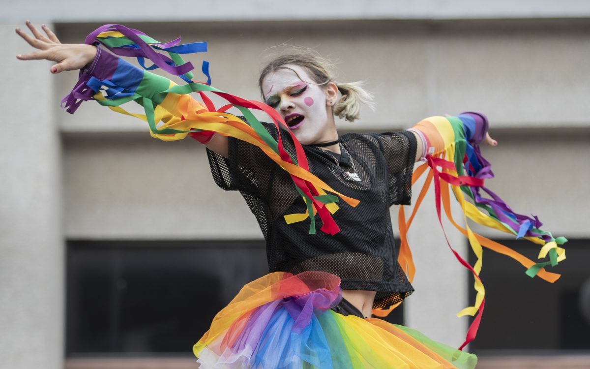 A UAY Dragling performer dances to “Applause” by Lady GaGa during the 53rd annual pride festival in downtown Iowa City on Saturday, June 15, 2024. The event included a parade, performances, and local vendor stations around downtown.
