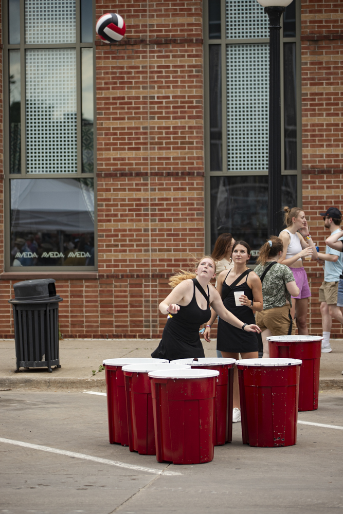 Iowa City Residents play giant cup pong during the 7th annual Downtown Iowa City Block Party on Saturday, June 22, 2024. 