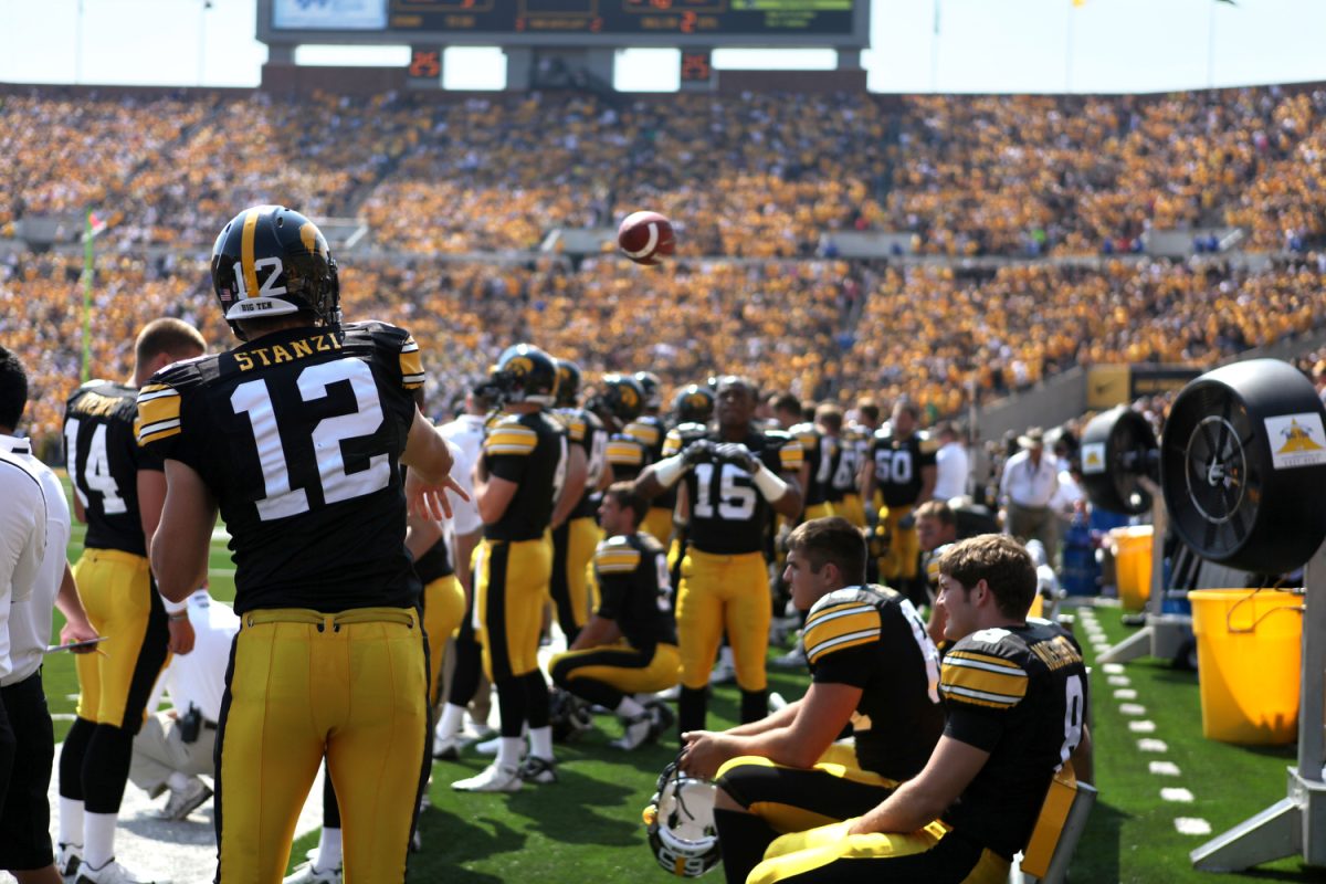 Iowa quarterback Ricky Stanzi practices on the sideline during Iowas first home game against UNI on Friday, Sept. 4, 2009, at Kinnick Stadium in Iowa City. Stanzi threw for 242 yards during the 17-16 win over the Panthers.