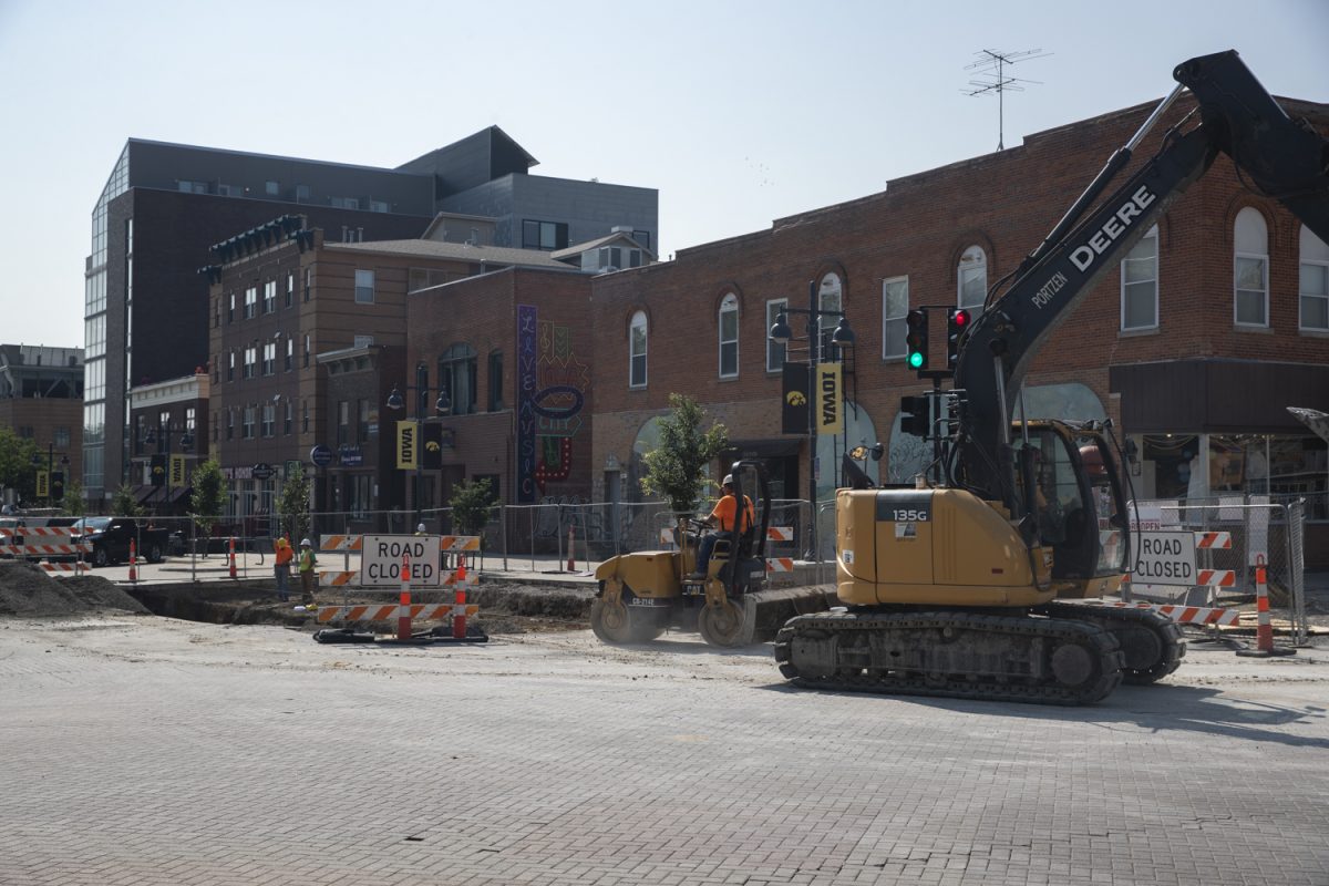 Construction on Iowa Ave. and Dubuque St. is seen in downtown Iowa City on Friday, July 12, 2024.