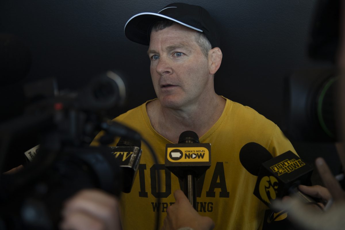 Iowa wrestling coach Tom Brands answers questions from the media during a press conference held in the Goschke Family Wrestling Training Center on Thursday, July 18, 2024.