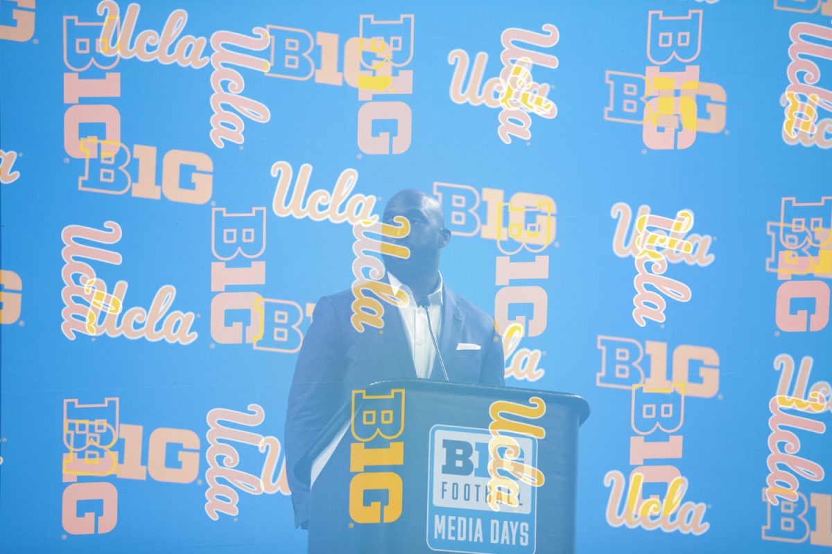 UCLA coach Deshaun Foster listens to a question during day two of Big Ten Football Media Day at Lucas Oil Stadium in Indianapolis, Ind., on Wednesday, July 24, 2024. Coaches and athletes from Iowa, UCLA, USC, Michigan State, Nebraska, and Penn State answered questions from the media.