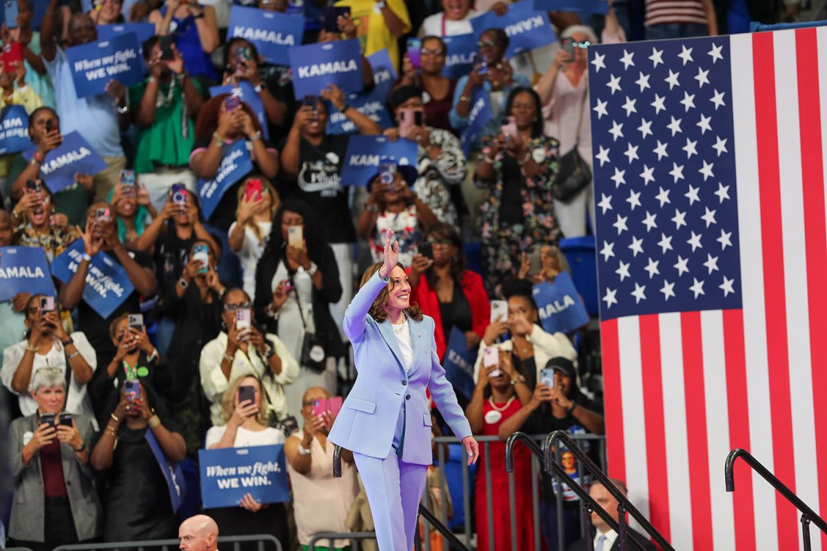 Tuesday, July 30, 2024; Atlanta, Ga; Vice President Kamala Harris waves to supporters during a presidential campaign rally on Tuesday, July 30, 2024 at the Georgia State Convocation Center in Atlanta, Ga.