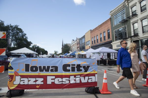 Community members leave downtown Iowa City during the first day of the Iowa City Jazz Festival on Friday, July 5, 2024. The festival began on Friday and ran until Sunday with dozens of performances from local and traveling musicians.