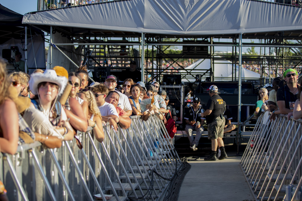 The crowd waits for Hippo Campus to perform during Hinterland Music Festival at the Avenue of the Saints Amphitheater in Saint Charles on Friday, Aug. 2, 2024.