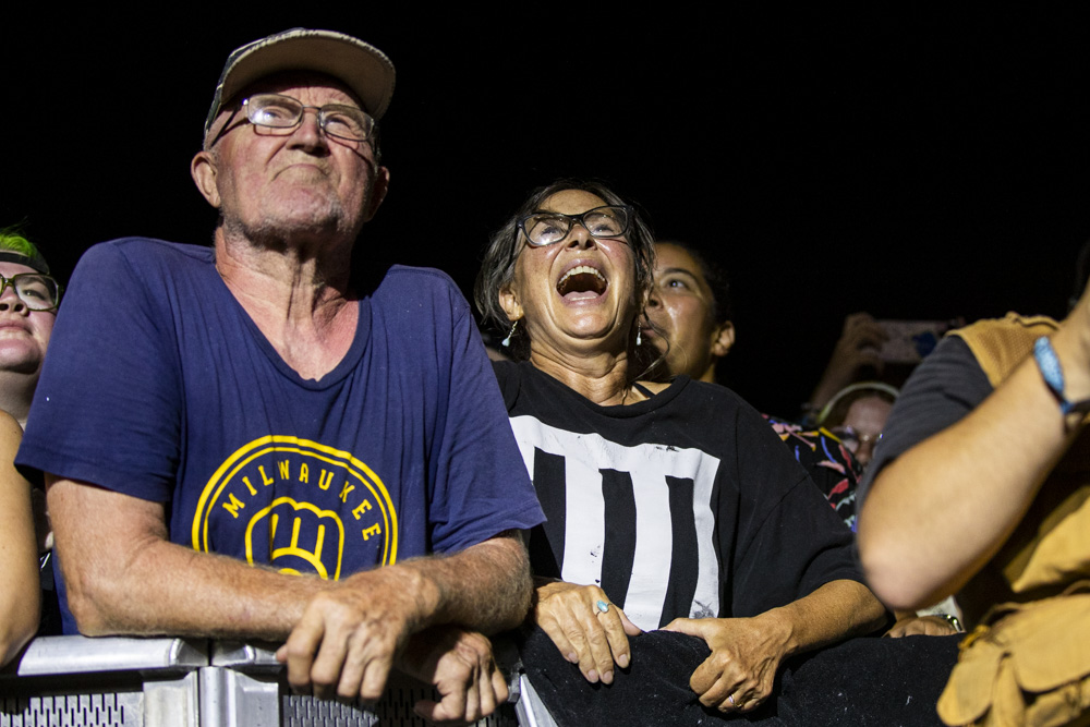 A fan cheers for Vampire Weekend’s headliner show during day two of Hinterland Music Festival at the Avenue of the Saints Amphitheater in Saint Charles on Saturday, Aug. 3, 2024.