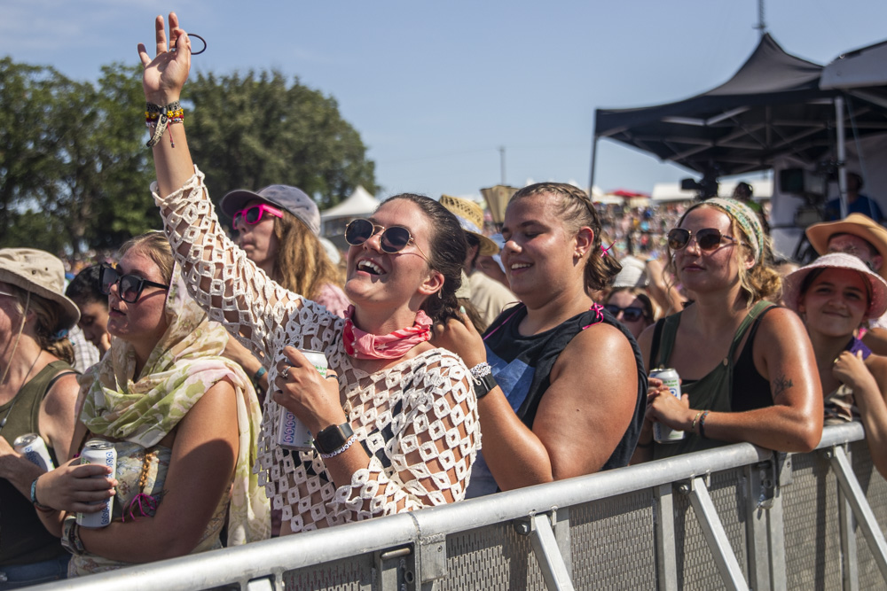 An attendee sings during the final day of Hinterland Music Festival at the Avenue of the Saints Amphitheater in Saint Charles on Sunday, Aug. 4, 2024.