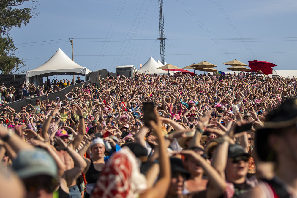 The crowd dances to Chappell Roan’s performance during the final day of Hinterland Music Festival at the Avenue of the Saints Amphitheater in Saint Charles on Sunday, Aug. 4, 2024. Chappel Roan's combination of midwest aesthetics and pop has brought midwest fashion to the national stage. 