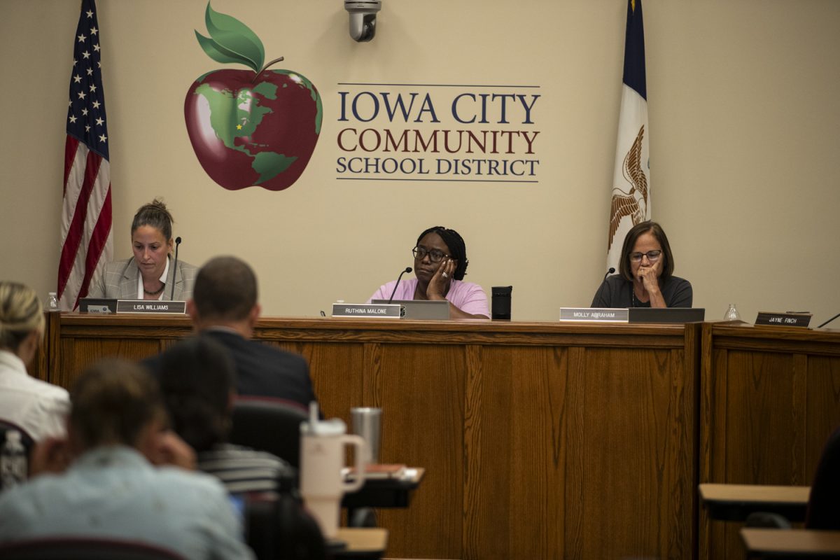 Board Member Lisa Williams, President Ruthina Malone, and Vice President Molly Abraham are seen during an Iowa City Community School District Meeting on Tuesday, Aug. 27, 2024. 