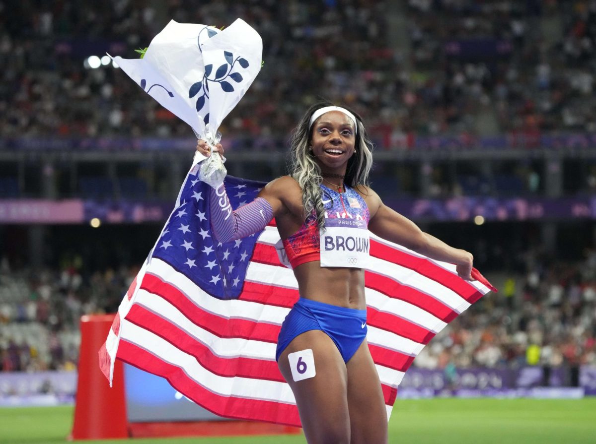 Aug 6, 2024; Saint-Denis, FRANCE; Brittany Brown (USA) celebrates her third place finish in the women's 200m final during the Paris 2024 Olympic Summer Games at Stade de France. 