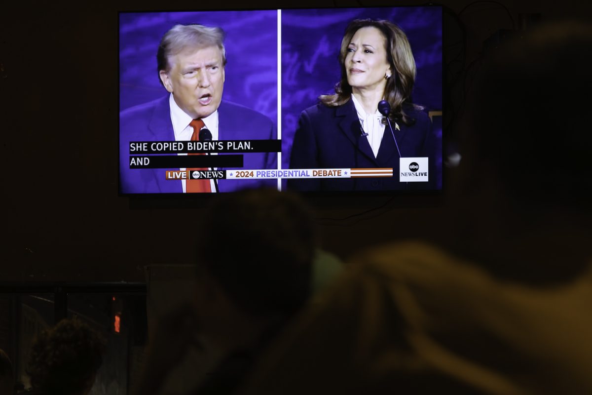 Attendees watch the 2024 Presidential debate during a watch party at The Airliner in Iowa City on Tuesday, Sept. 10, 2024. The watch party was hosted by the Eastern Iowa Young Republicans