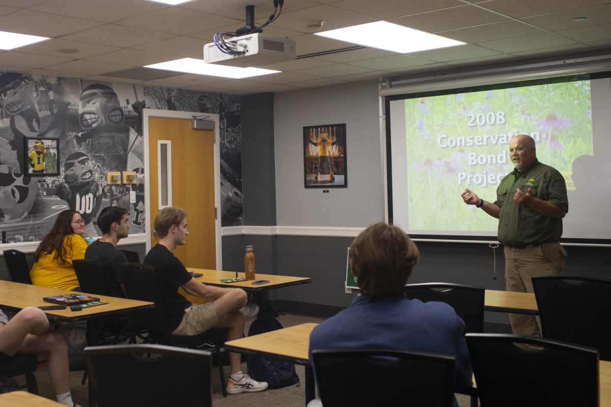 Johnson County Conservation Program Manager, Brad Freidhof, speaks during a University Democrats at Iowa meeting in the Iowa Memorial Union on Monday, Sept. 30, 2024.