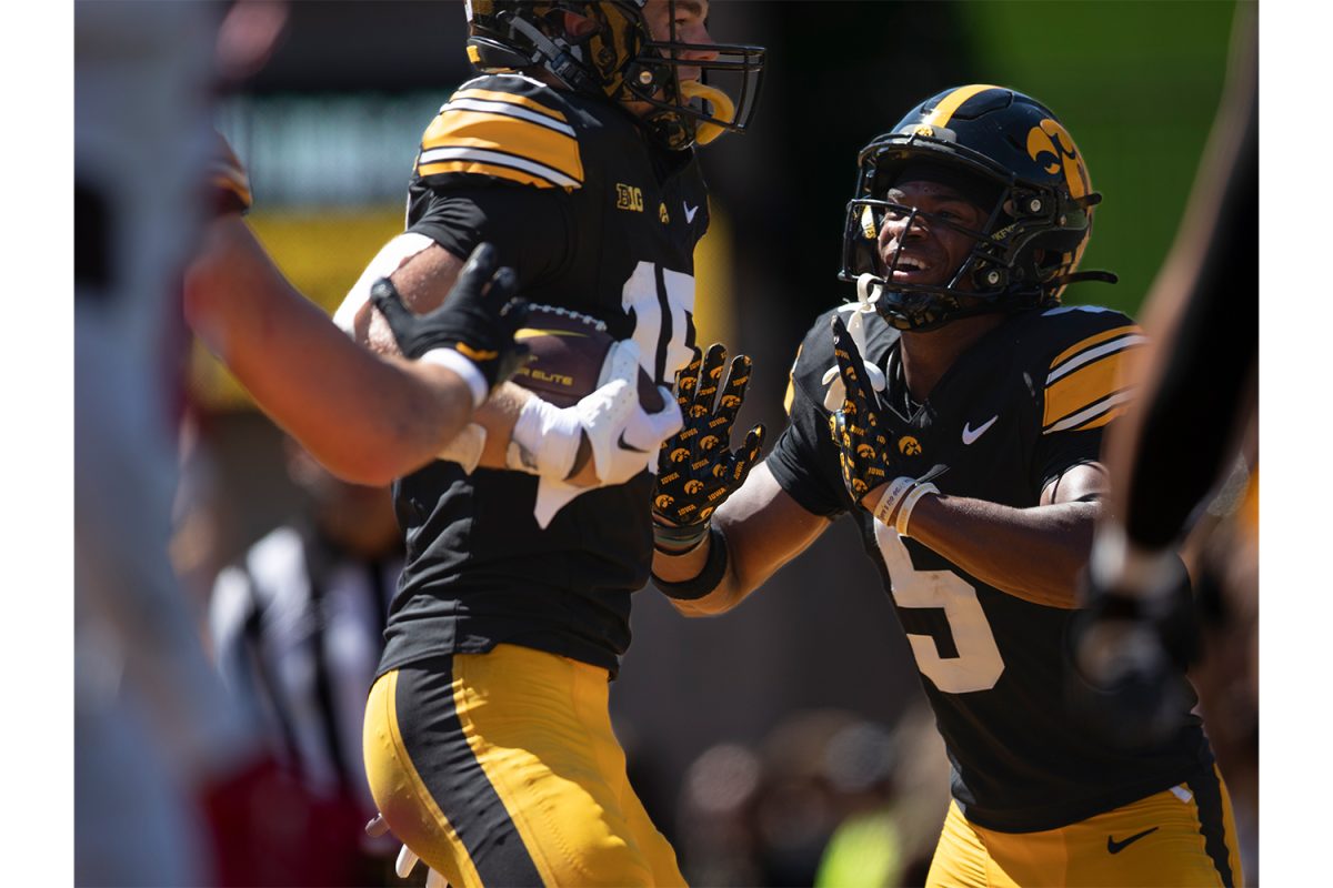 Iowa wide receivers Reece Vander Zee and Jacob Gill celebrate during a football game between Iowa and Illinois State at Kinnick Stadium on Saturday, Aug. 31, 2024. The Hawkeyes defeated the Redbirds 40-0. 