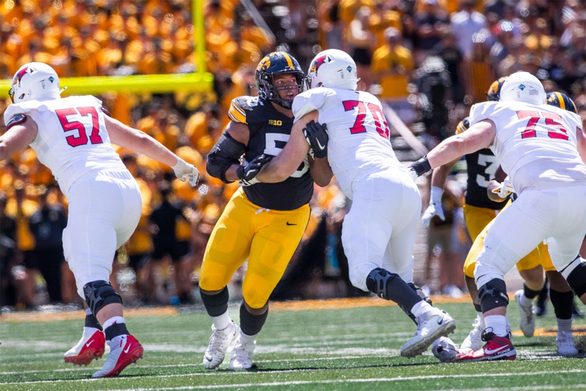 Iowa defensive lineman Jeremiah Pittman pushes Illinois State offensive lineman JJ Guedet during a football game between Iowa and Illinois State at Kinnick Stadium in Iowa City on Saturday, Aug. 31, 2024. The Hawkeyes defeated the Redbirds 40-0. 