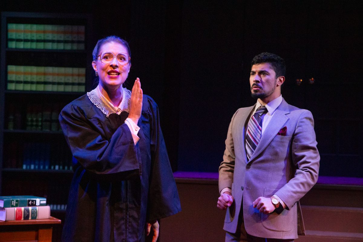 Ruth Bader Ginsburg, played by Mary Jane Knight, argues with The Commentator, played by Phillip Lopez, during a performance of Scalia/Ginsburg at the Riverside Theatre on Tuesday, Sept. 3, 2024. The opera was written by Derrick Wang and will be showing Sept. 5-15.