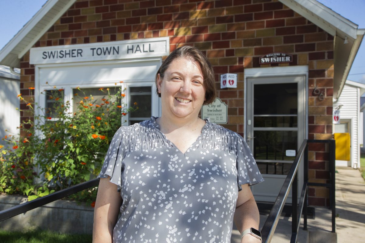 Swisher Mayor Julie Persons poses for a portrait outside of the City Hall building in downtown Swisher, Iowa on Sept. 6, 2024. “Jump in feet first, that’s what I like to do in a new department. Just start the conversations right away, figure out what needs to get done, and just start working through everything,” Persons said.