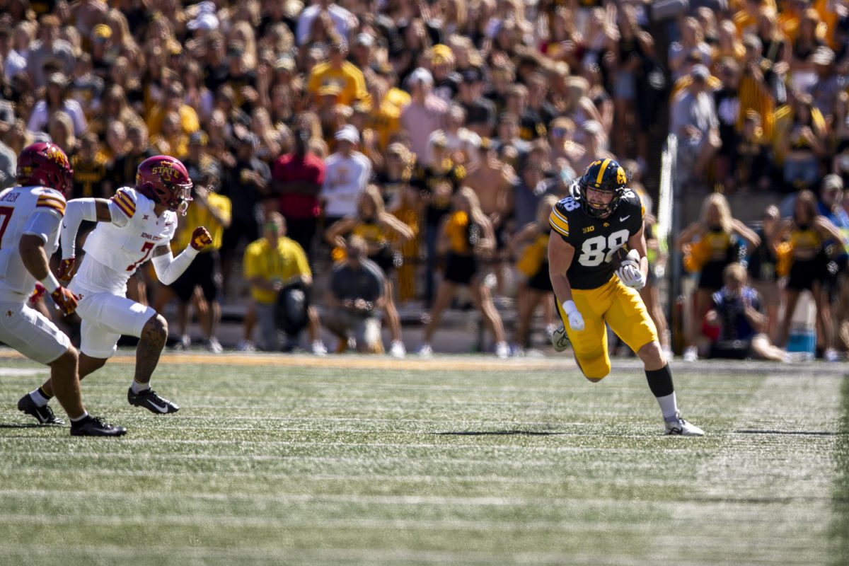 Iowa fullback Hayden Large carries the ball during a Cy-Hawk football game between No. 21 Iowa and Iowa State at Kinnick Stadium on Saturday, Sept. 7, 2024. The Hawkeyes lead the Cyclones, 13-0, after the first half. 