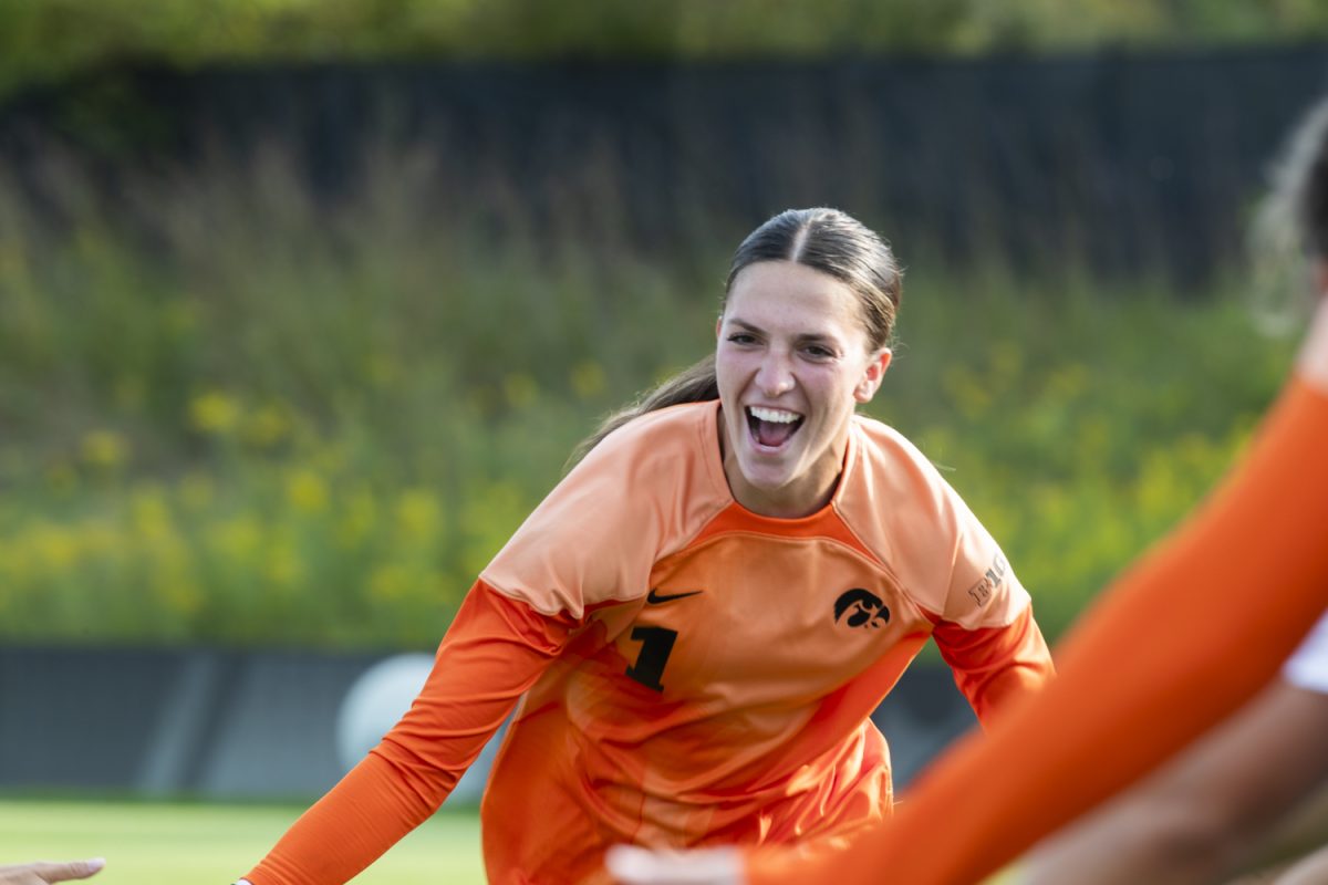 Goalkeeper Macy Enneking high fives teammates before a soccer match between the University of Iowa and Baylor University at the Iowa Soccer Complex  in Iowa City on Sunday, Sept. 8, 2024. The Hawkeyes defeated the Bears 3-0.