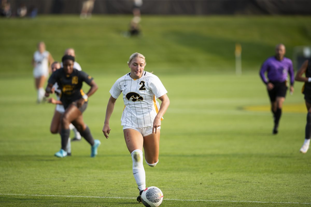 Iowa forward Berit Parten runs the ball down field during a soccer match between the University of Iowa and Baylor University at the Iowa Soccer Complex  in Iowa City on Sunday, Sept. 8, 2024. The Hawkeyes defeated the Bears 3-0.