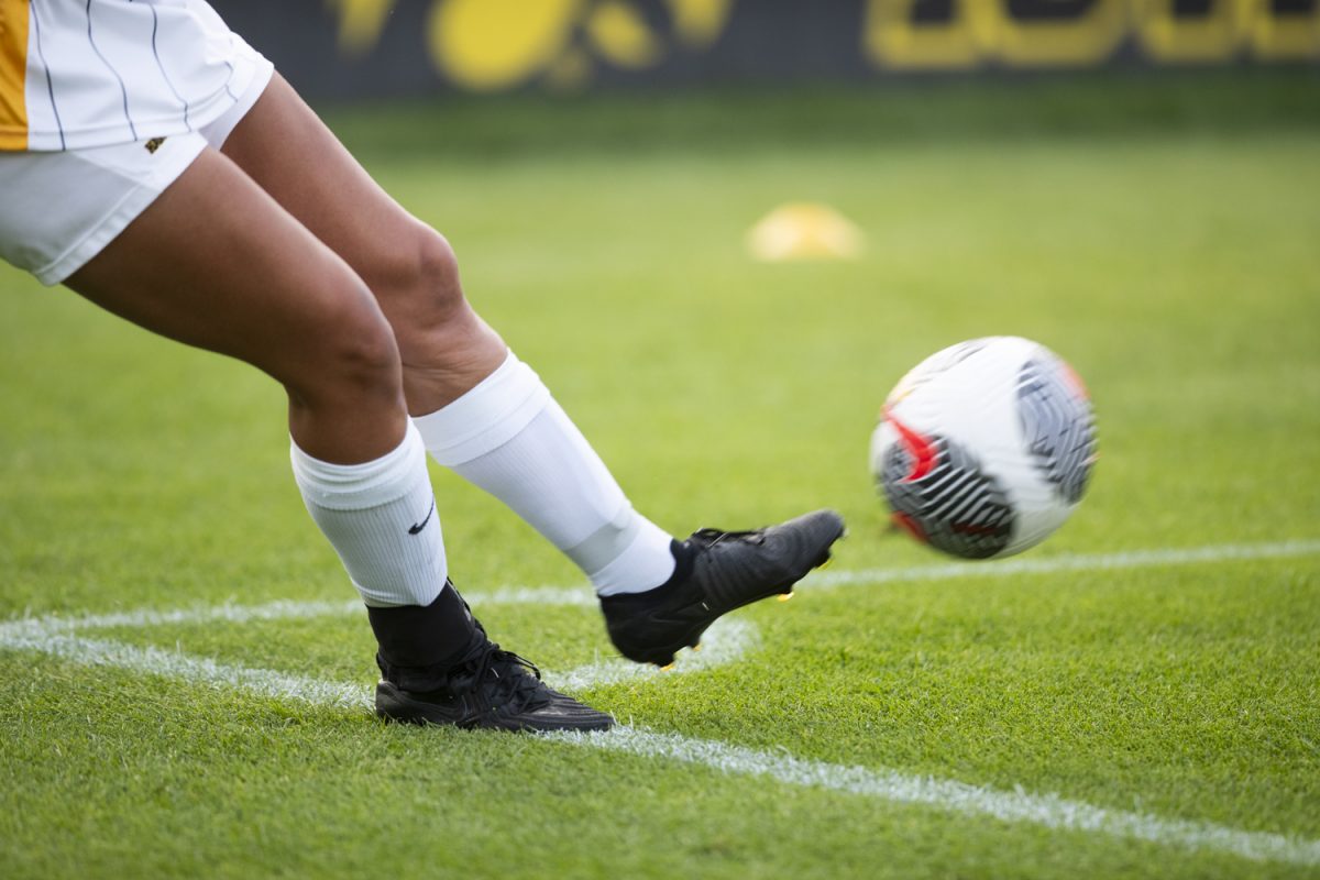 An Iowa player makes a corner kick during a soccer match between the University of Iowa and Baylor University at the Iowa Soccer Complex  in Iowa City on Sunday, Sept. 8, 2024. The Hawkeyes defeated the Bears 3-0.