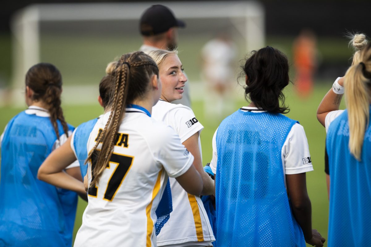 Iowa forward Delaney Holtey congratulates forward Berit Parten after her goal during a soccer match between the University of Iowa and Baylor University at the Iowa Soccer Complex  in Iowa City on Sunday, Sept. 8, 2024. The Hawkeyes defeated the Bears 3-0.